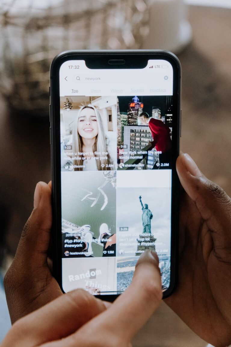 Person Holding Black Iphone 5